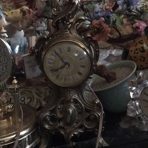 figurine clock